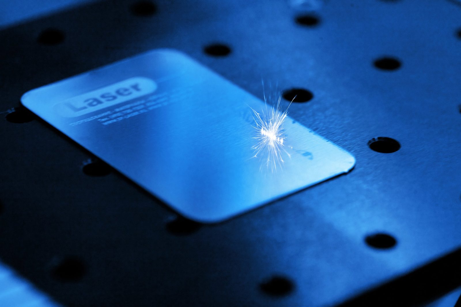 Fiber laser marking a metal plate
